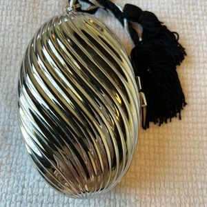 Evening bag, silver hard case.